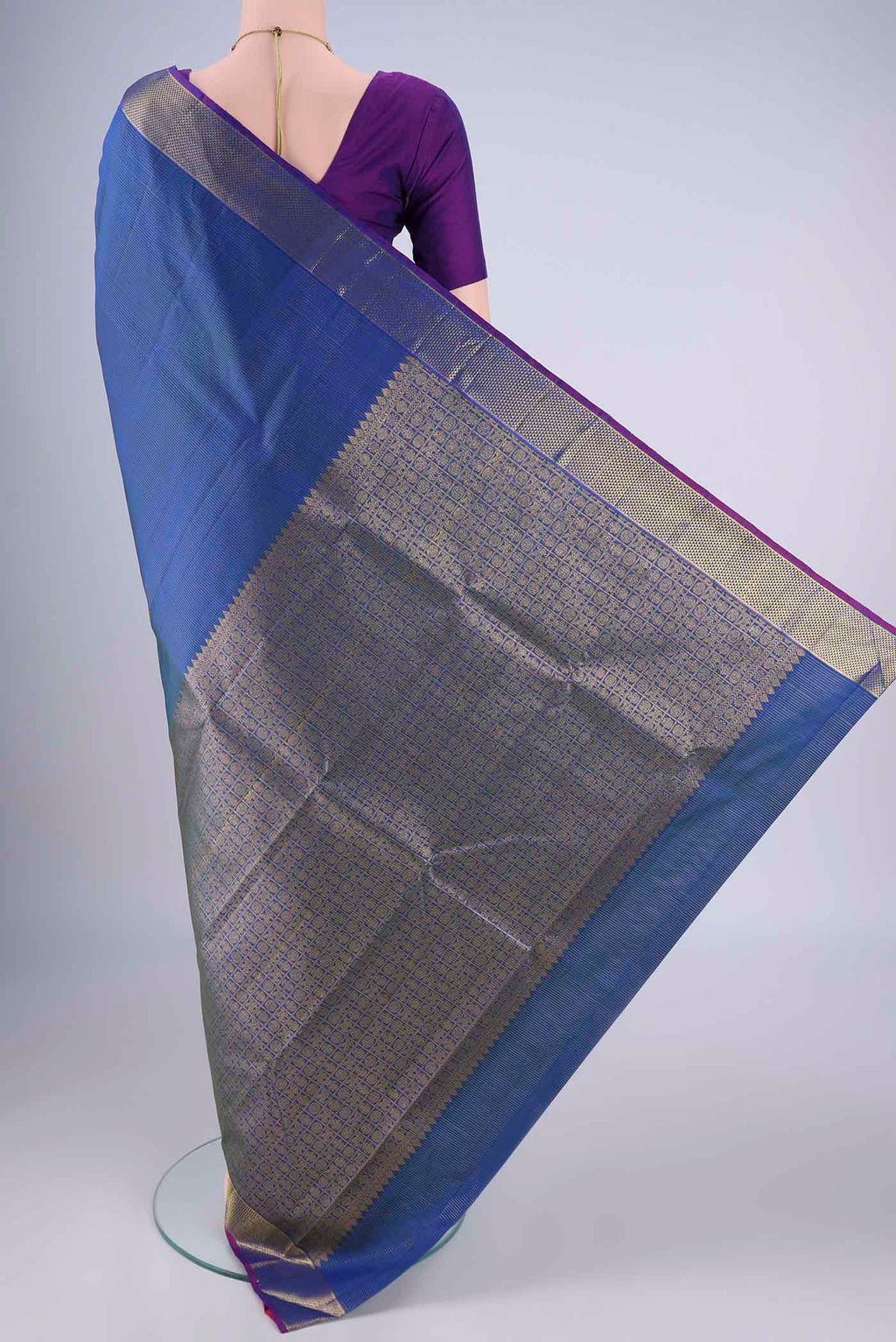 Flat view of Blue Kanjivaram Silk Saree with Stripes on the body and Zari Border. 