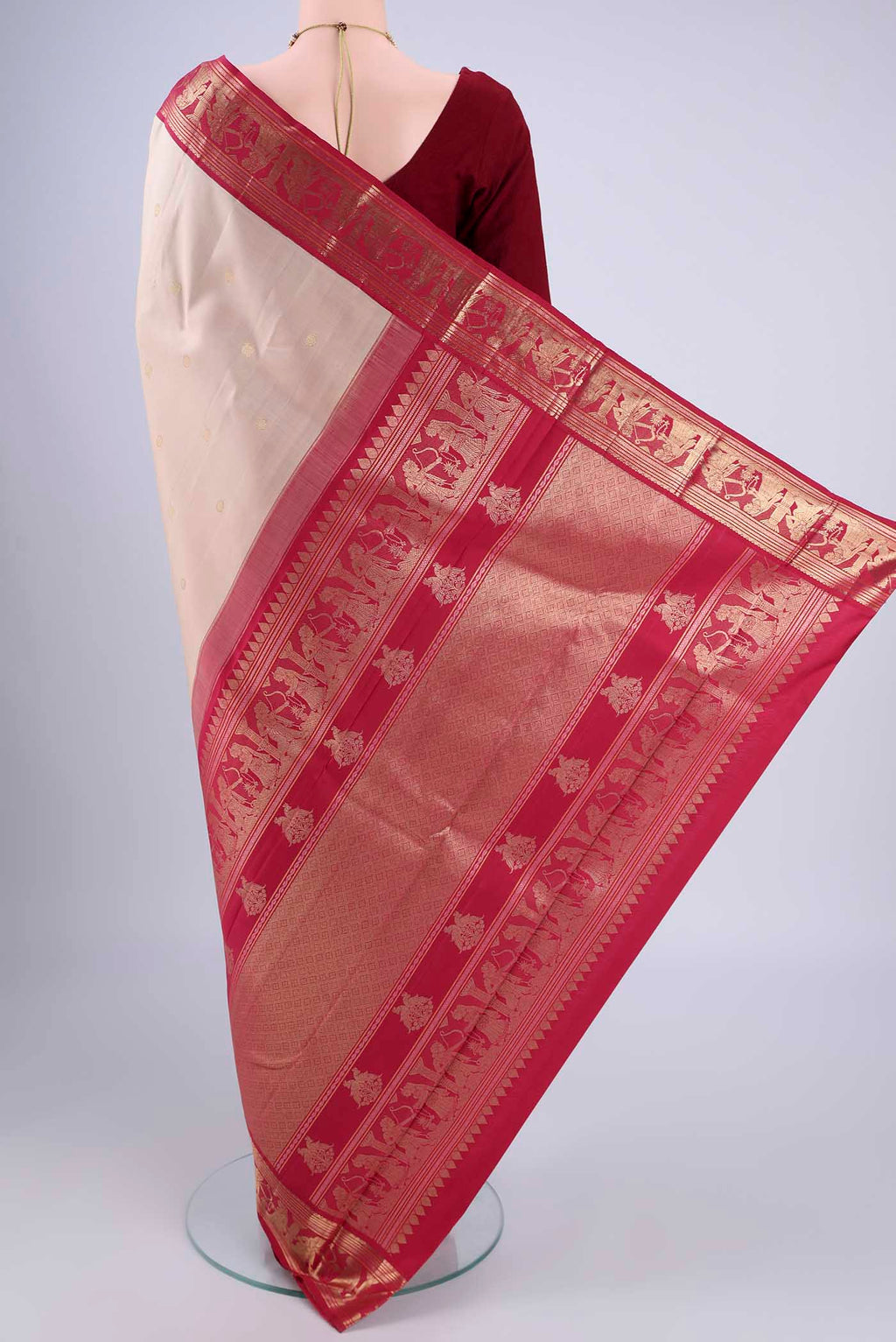 Flat view of Beige Kanjivaram Silk Saree with Zari Butta on the body and Zari Border. 