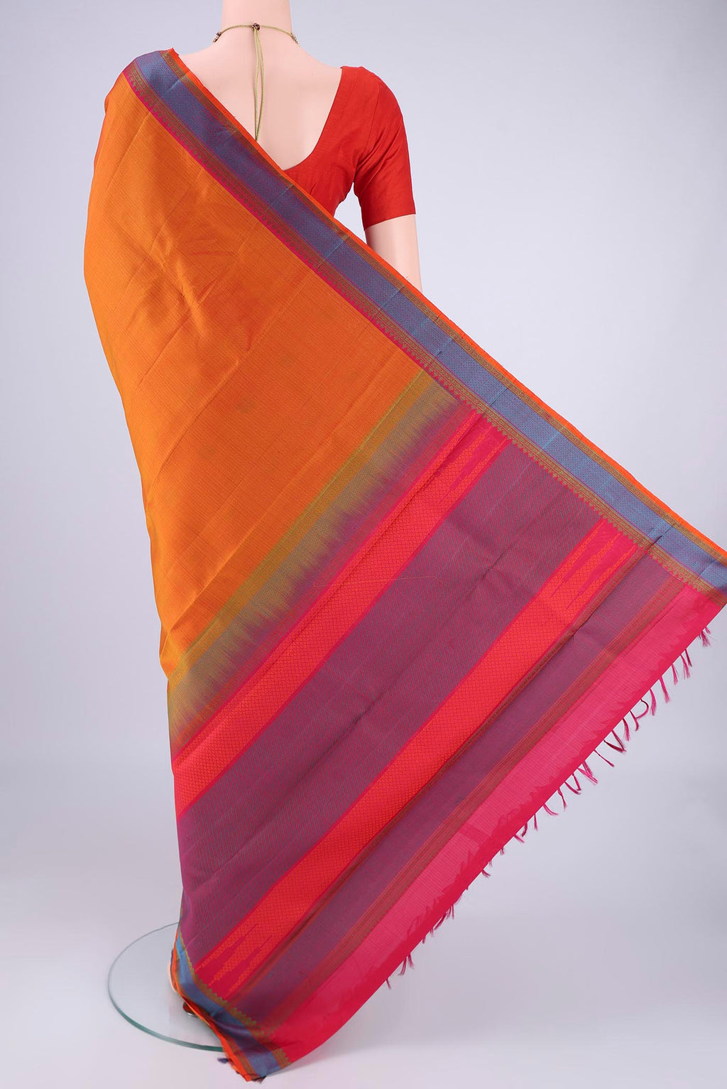 Flat view of Mustard Kanchipuram Silk Saree with Plain Body and Thread Border. 