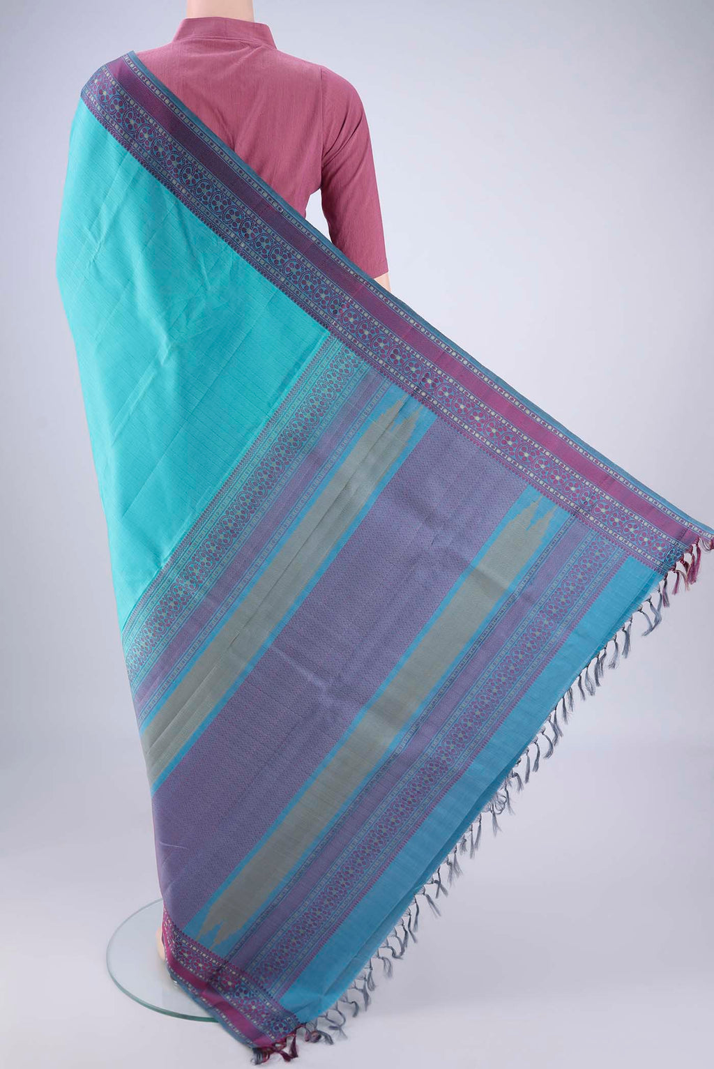 Flat view of Sky Blue Kanchipuram Silk Saree with Plain Body and Thread Border. 