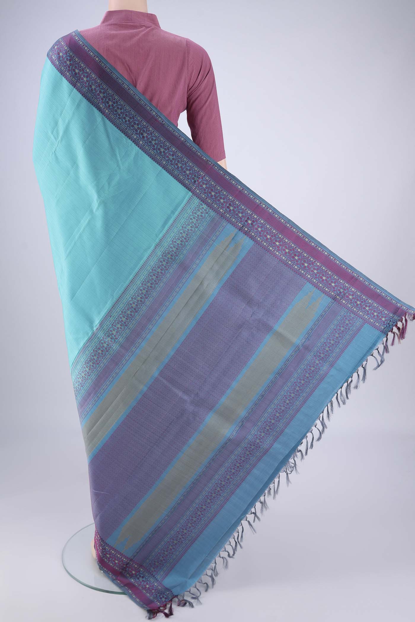 Flat view of Sky Blue Kanchipuram Silk Saree with Plain Body and Thread Border. 