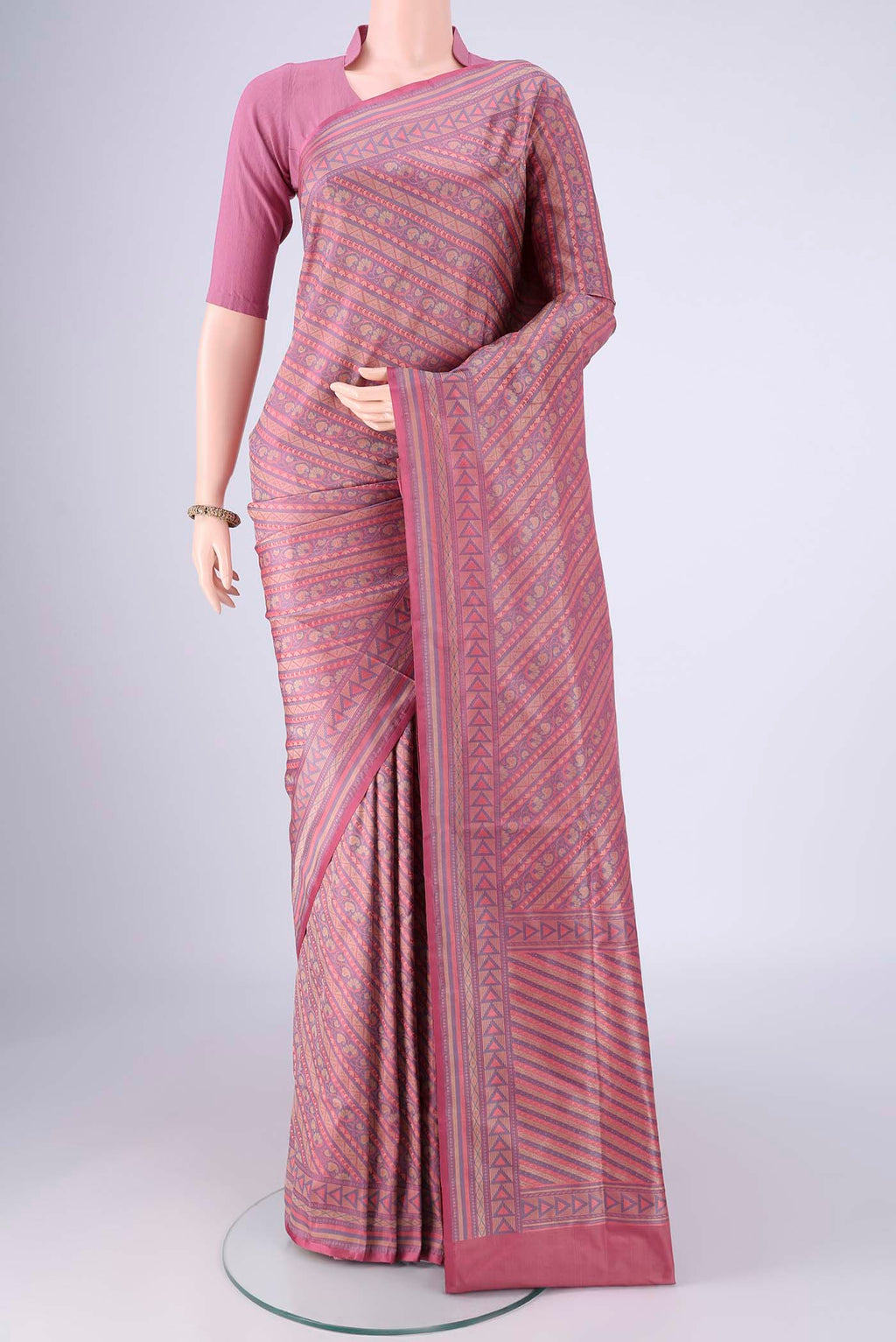 Rose pink Banarasi Tanchoi Silk Saree with Jacquard design on the body and Zari Border.  displayed on a mannequin