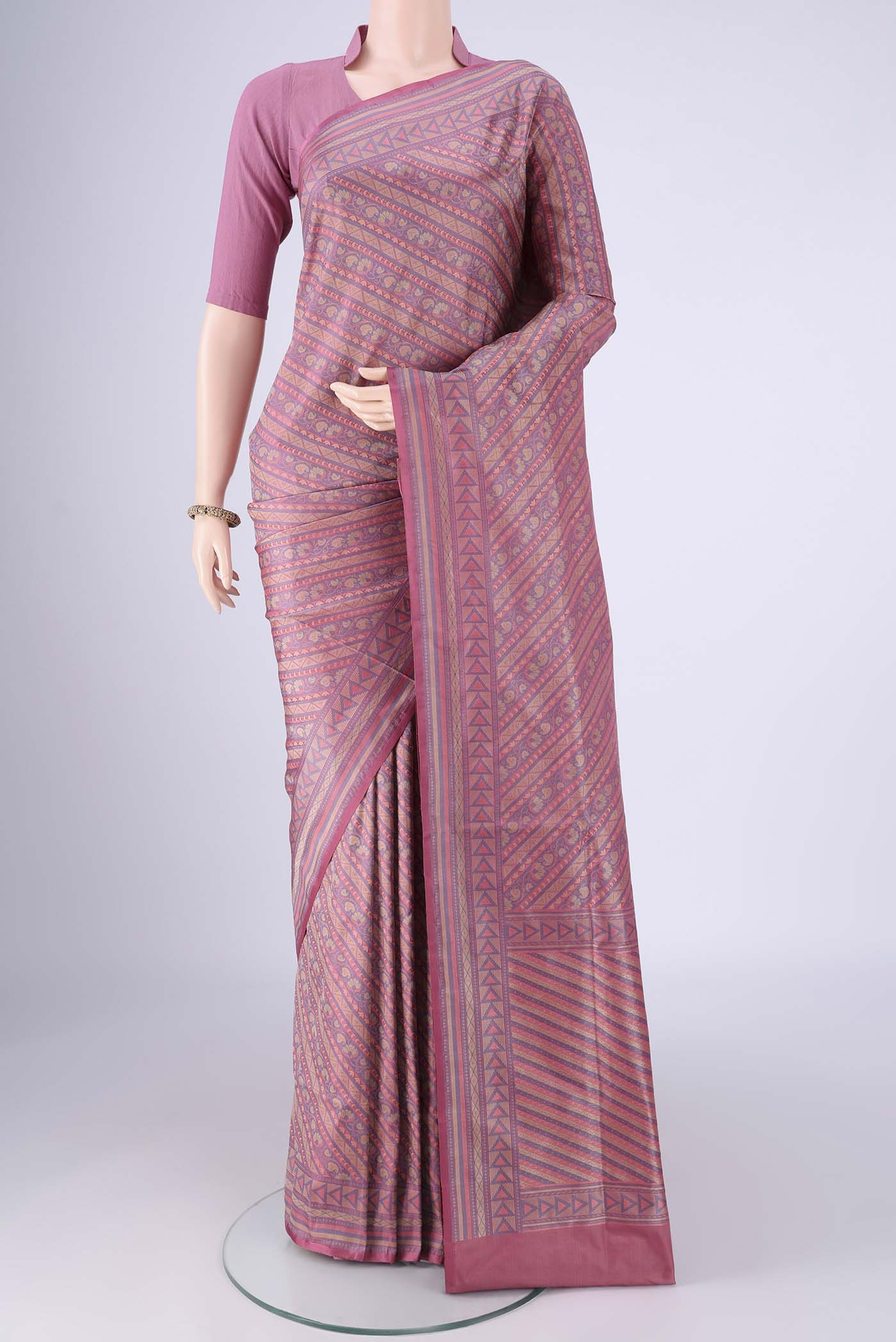 Rose pink Banarasi Tanchoi Silk Saree with Jacquard design on the body and Zari Border.  displayed on a mannequin