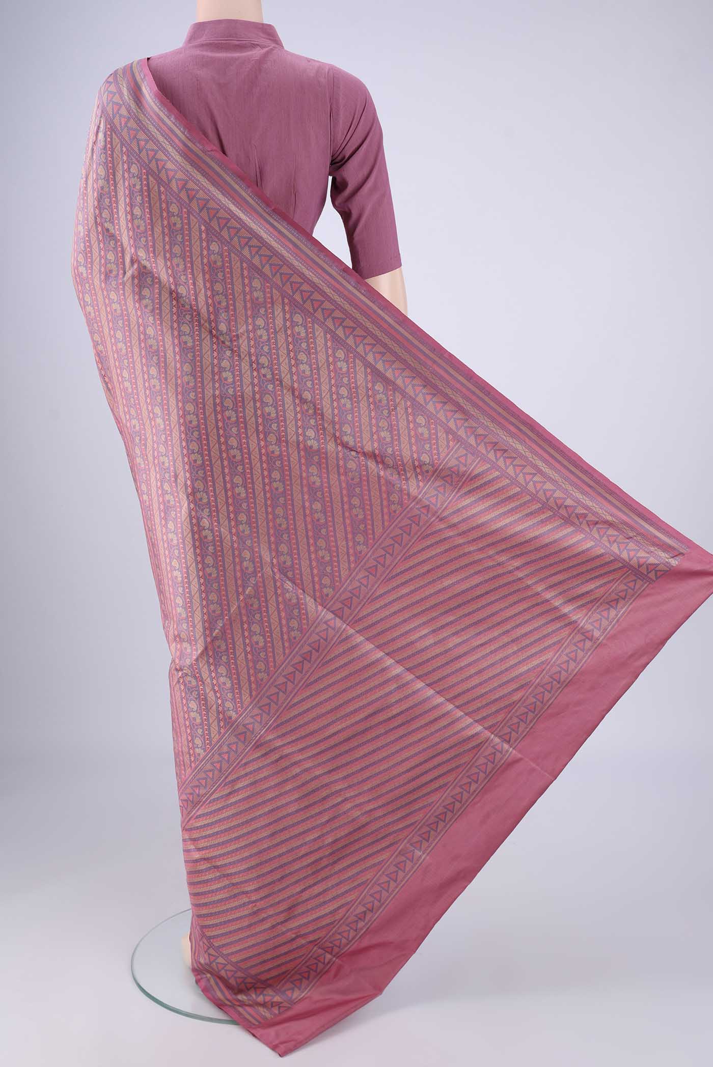 Flat view of Rose pink Banarasi Tanchoi Silk Saree with Jacquard design on the body and Zari Border. 