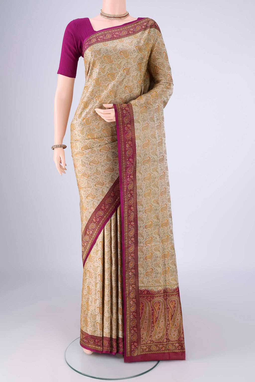 Beige Banarasi Tanchoi Silk Saree with Jacquard design on the body and Thread Border.  displayed on a mannequin