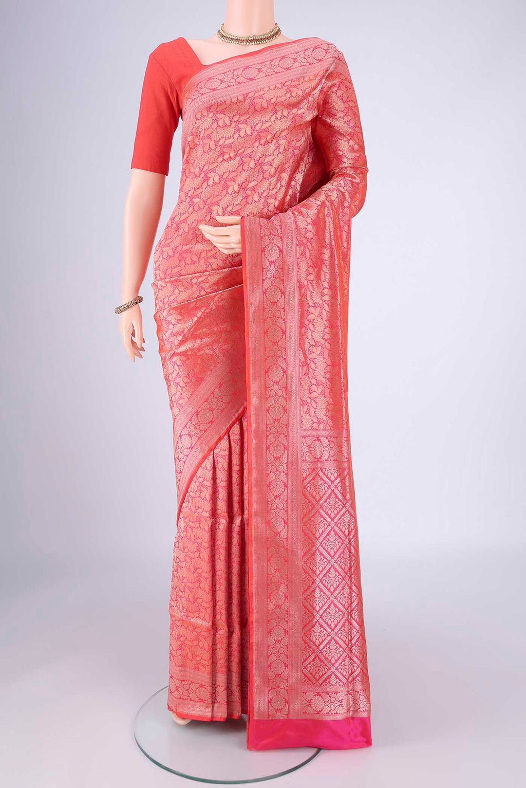 Pink Banarasi Silk Saree with Zari Brocade on the body and Zari Border.  displayed on a mannequin