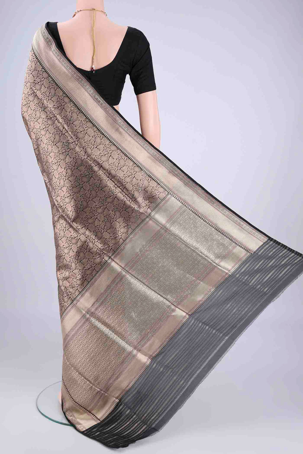 Flat view of Black Banarasi Silk Saree with Zari Brocade on the body and Zari Border. 