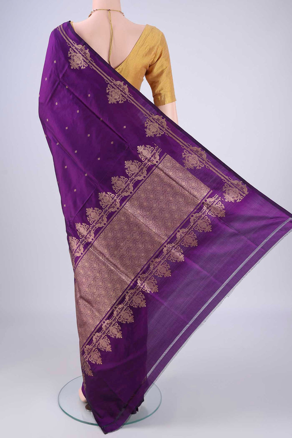 Flat view of Violet Banarasi Katan Silk Saree with Zari Butta on the body and Zari Border. 