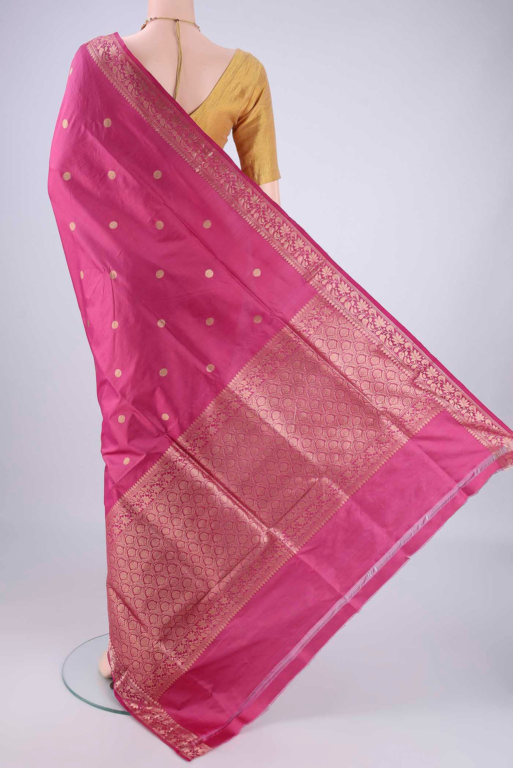 Flat view of Pink Banarasi Katan Silk Saree with Zari Butta on the body and Zari Border. 