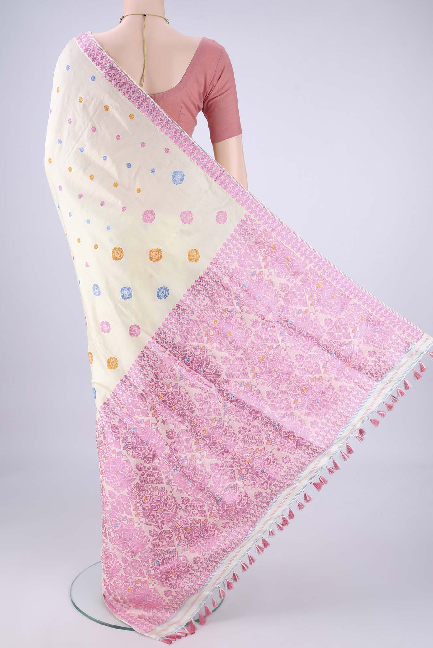 Flat view of Off White Assam Silk Saree with Thread Butta on the body and Thread Border. 