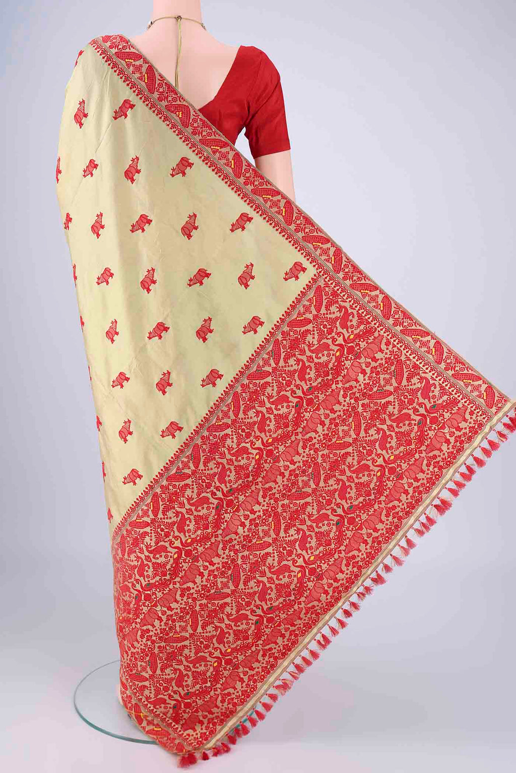 Flat view of Sage Green Assam Silk Saree with Thread Butta on the body and Thread Border. 