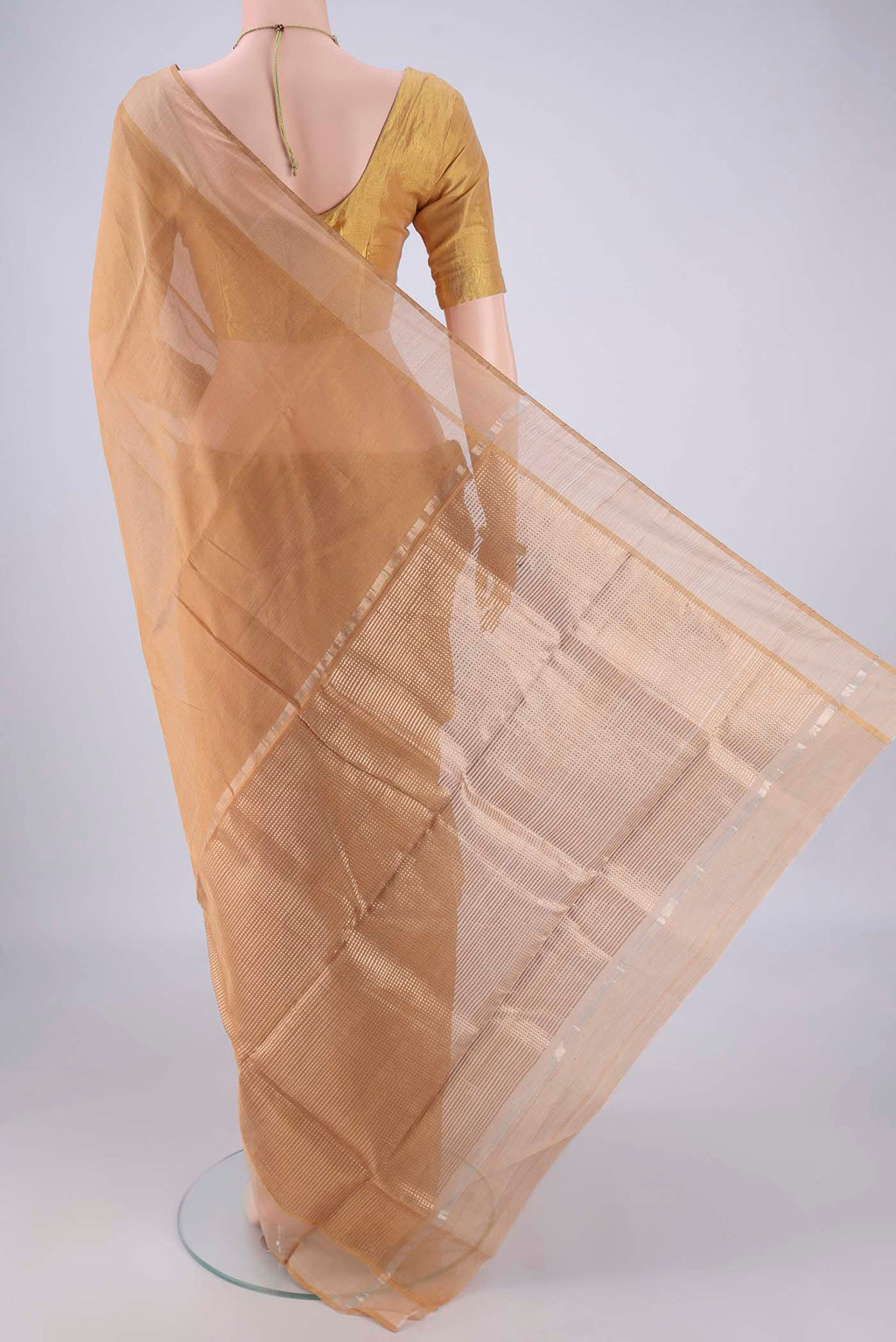 Flat view of Dark Beige Chanderi Silk Cotton Saree with Plain Body and Zari Border. 