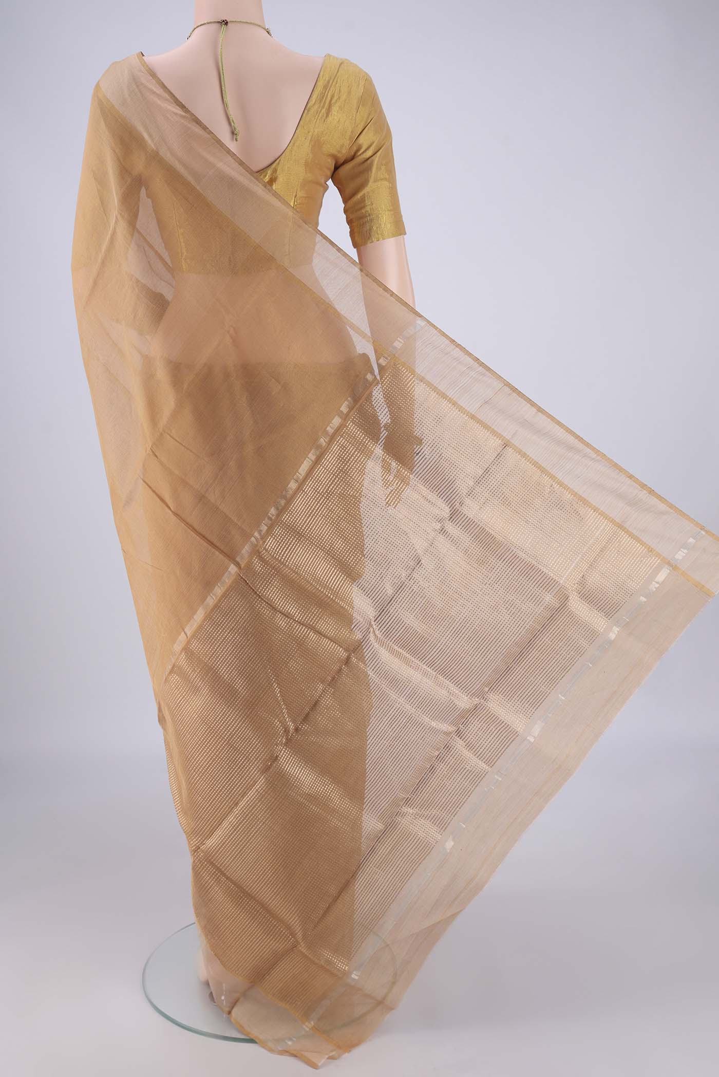 Flat view of Dark Beige Chanderi Silk Cotton Saree with Plain Body and Zari Border. 