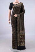 Pure Silk Black Banarasi Saree with Thread Brocade on the body and Zari Border.  displayed on a mannequin