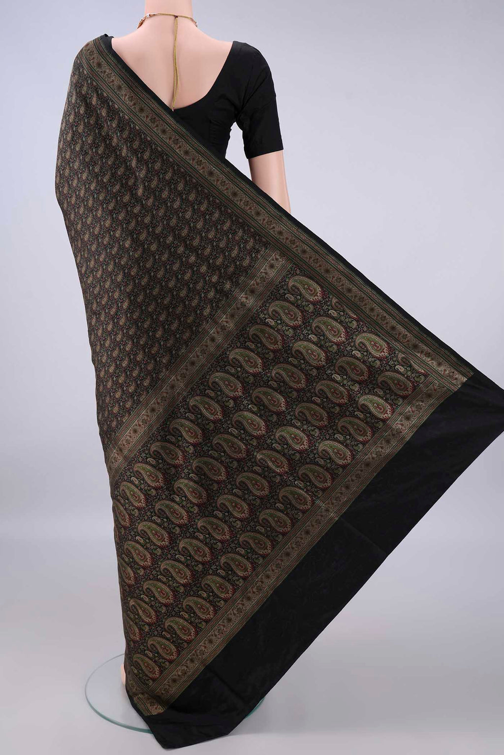 Flat view of Pure Silk Black Banarasi Saree with Thread Brocade on the body and Zari Border. 
