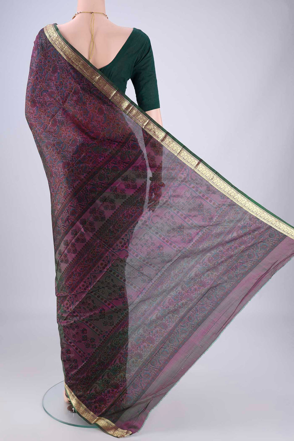 Flat view of Purple Printed Silk Saree with Printed design on the body and Zari Border. 