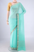 Sky Blue Mysore Chiffon Saree with Plain Body and Zari Border.  displayed on a mannequin