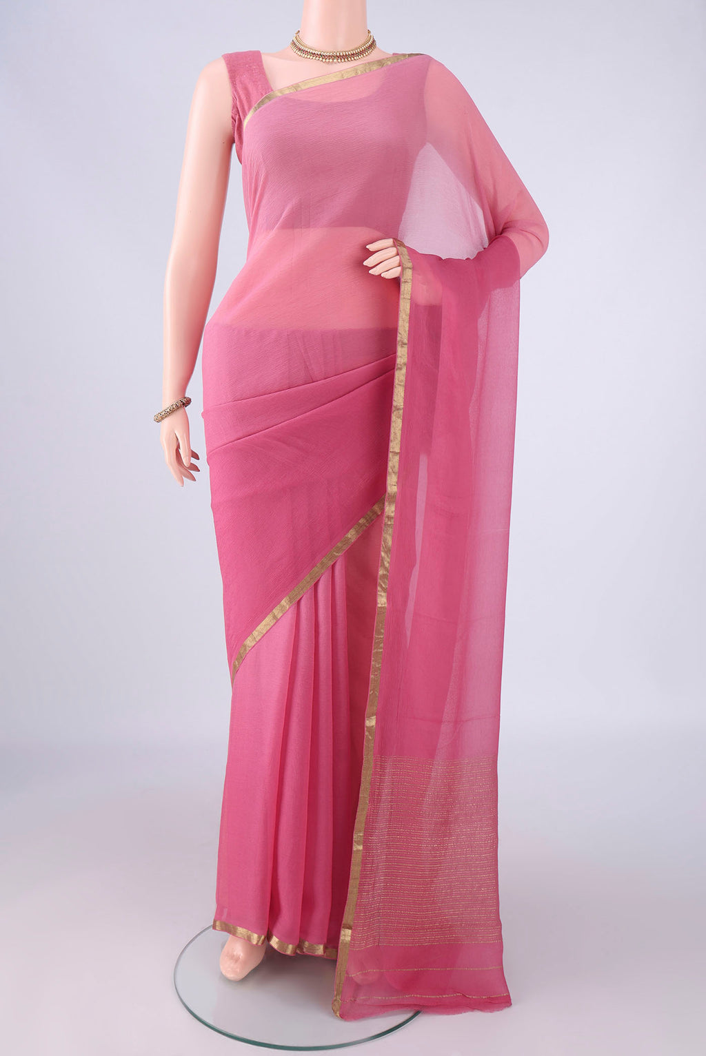 Pink Mysore Chiffon Saree with Plain Body and Zari Border.  displayed on a mannequin