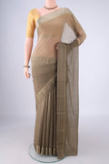 Dark Beige Mysore Chiffon Saree with Plain Body and Zari Border.  displayed on a mannequin