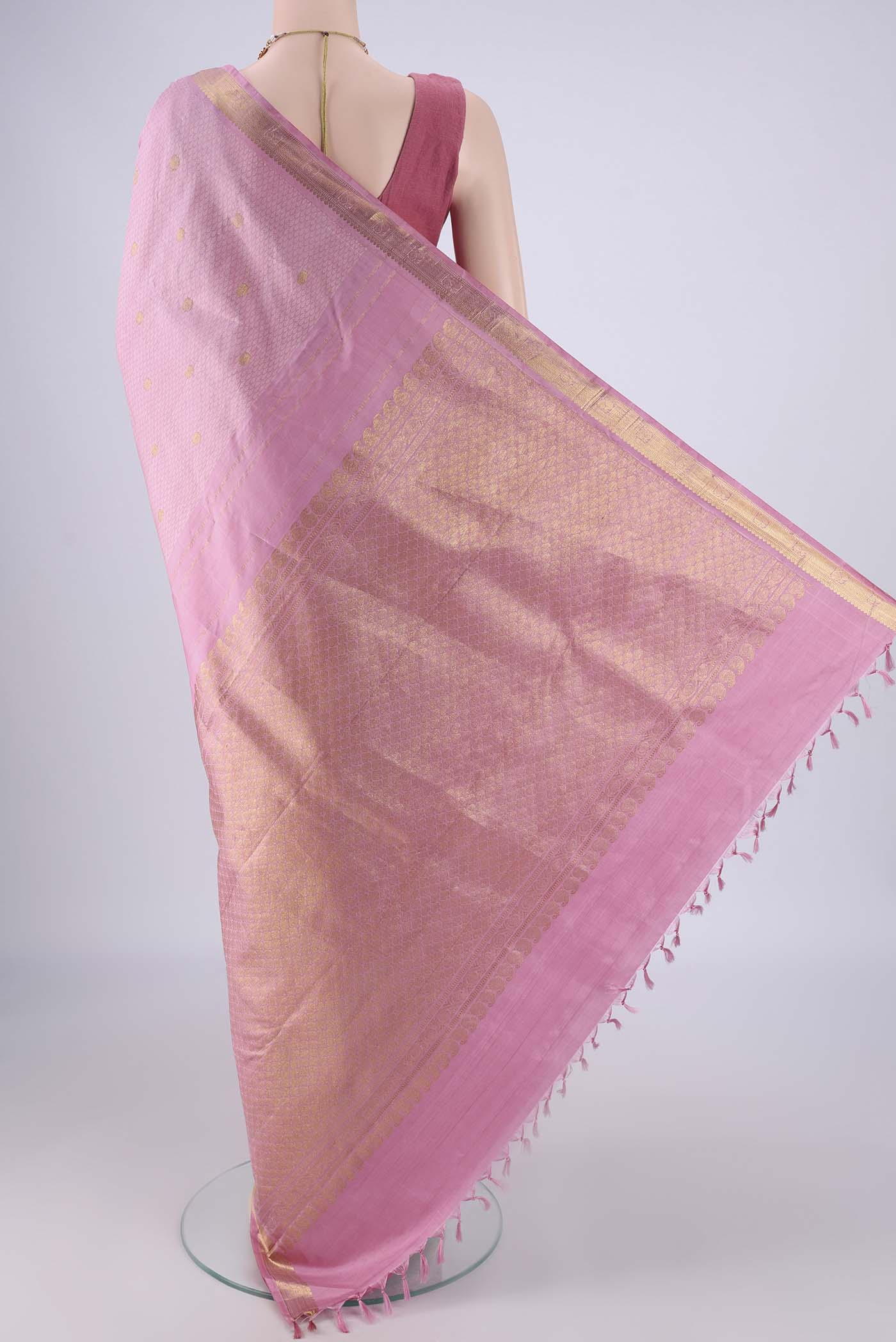 Flat view of Rose pink Kanjivaram Silk Saree with Jacquard With Zari Butta on the body and Zari Border. 