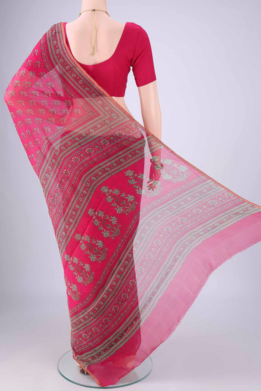 Flat view of Rani Pink Mysore Chiffon Saree with Floral Print on the body and Printed Border. 