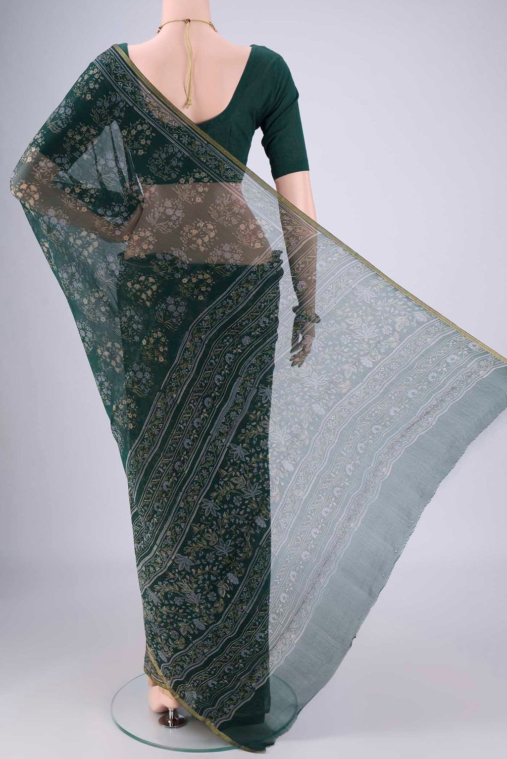Flat view of Bottle Green Mysore Chiffon Saree with Floral Print on the body and Thin Zari Line. 