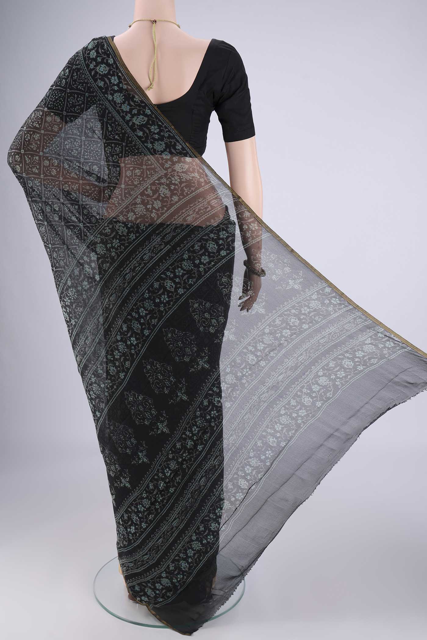 Flat view of Black Mysore Chiffon Saree with Floral Print on the body and Thin Zari Line. 