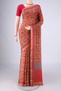 Brown Mysore Crepe Saree with Printed design on the body and Zari Border.  displayed on a mannequin