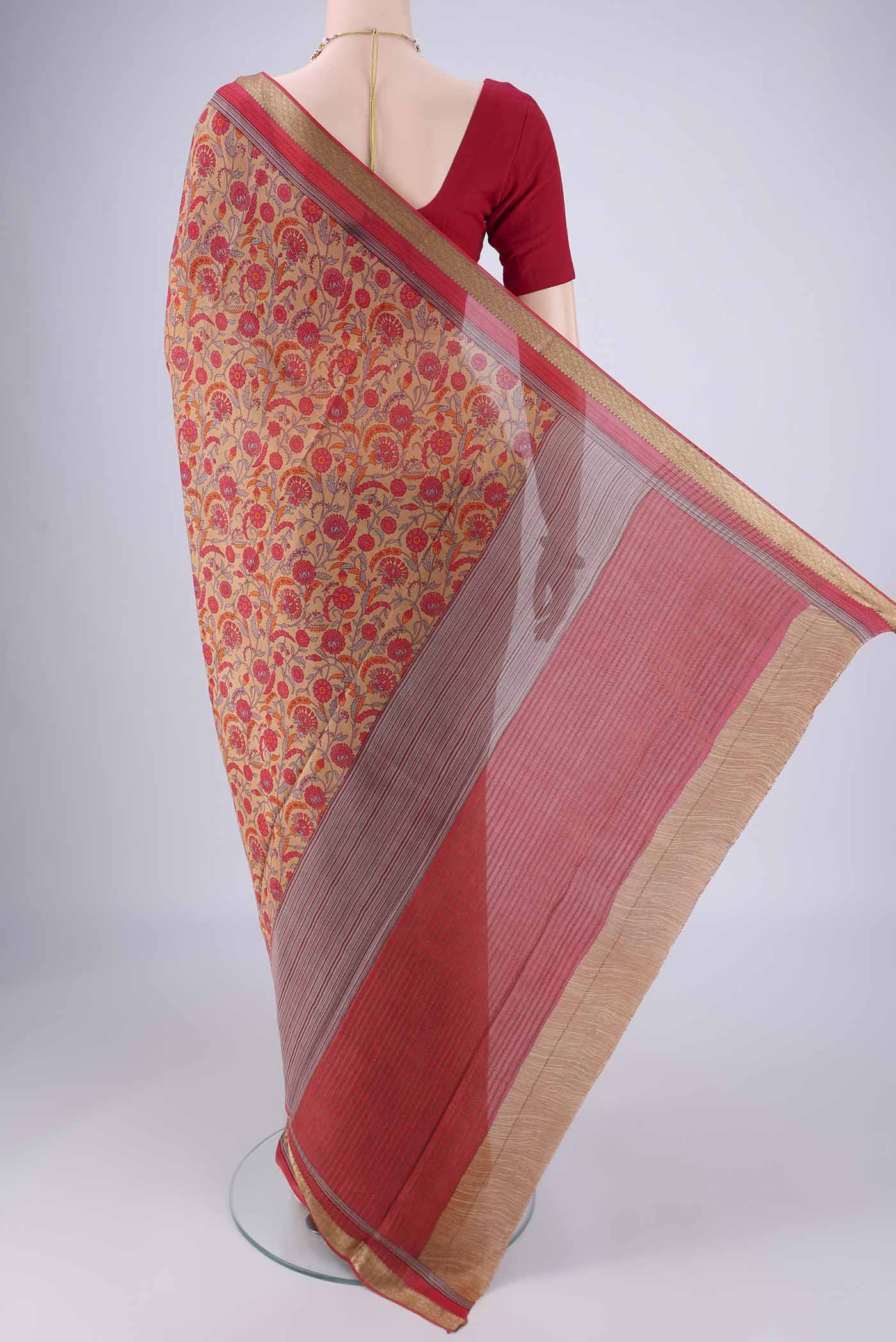 Flat view of Brown Mysore Crepe Saree with Printed design on the body and Zari Border. 