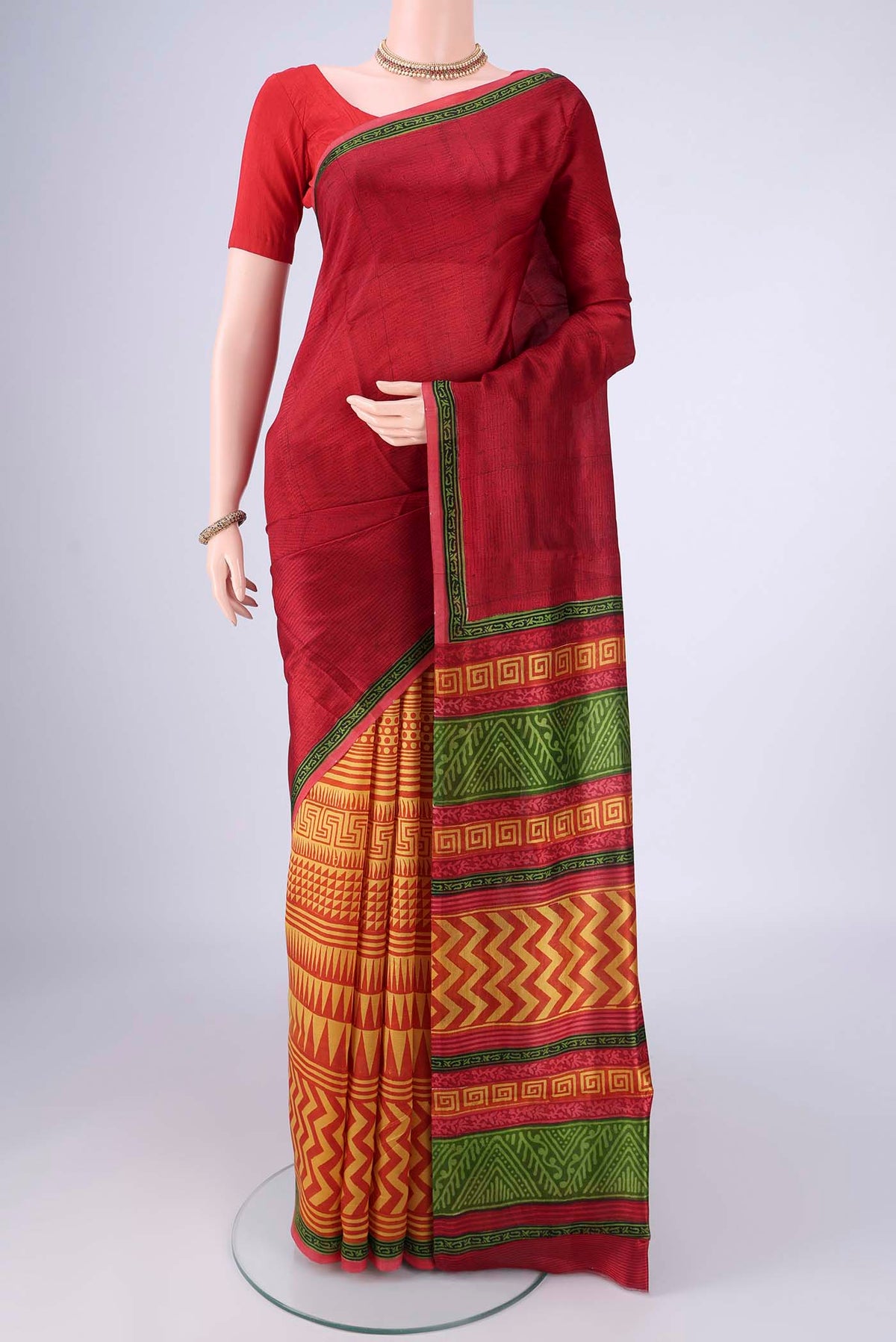 Multi Color Printed Silk Saree with Printed design on the body and Printed Border.  displayed on a mannequin