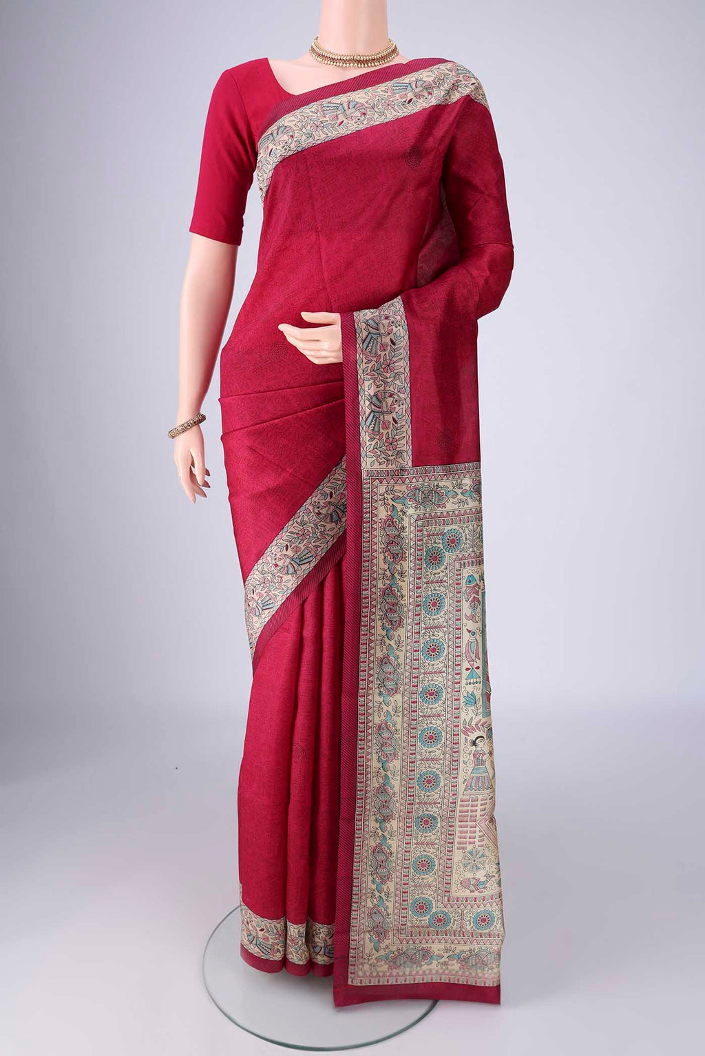 Dark Pink Printed Silk Saree with Printed design on the body and Printed Border.  displayed on a mannequin