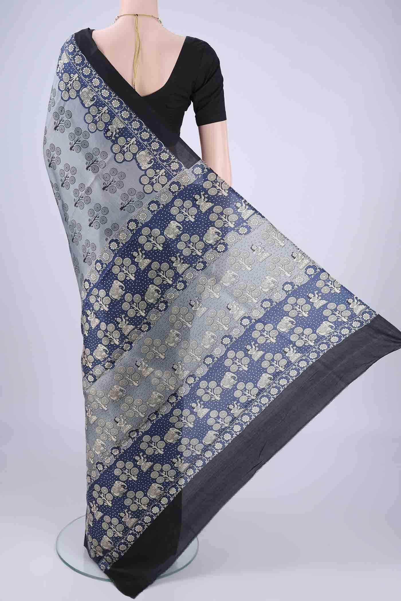 Flat view of Davys Grey Printed Silk Saree with Printed design on the body and Printed Border. 