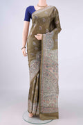 Sage Green Tussar Saree with Printed design on the body and Without Border.  displayed on a mannequin