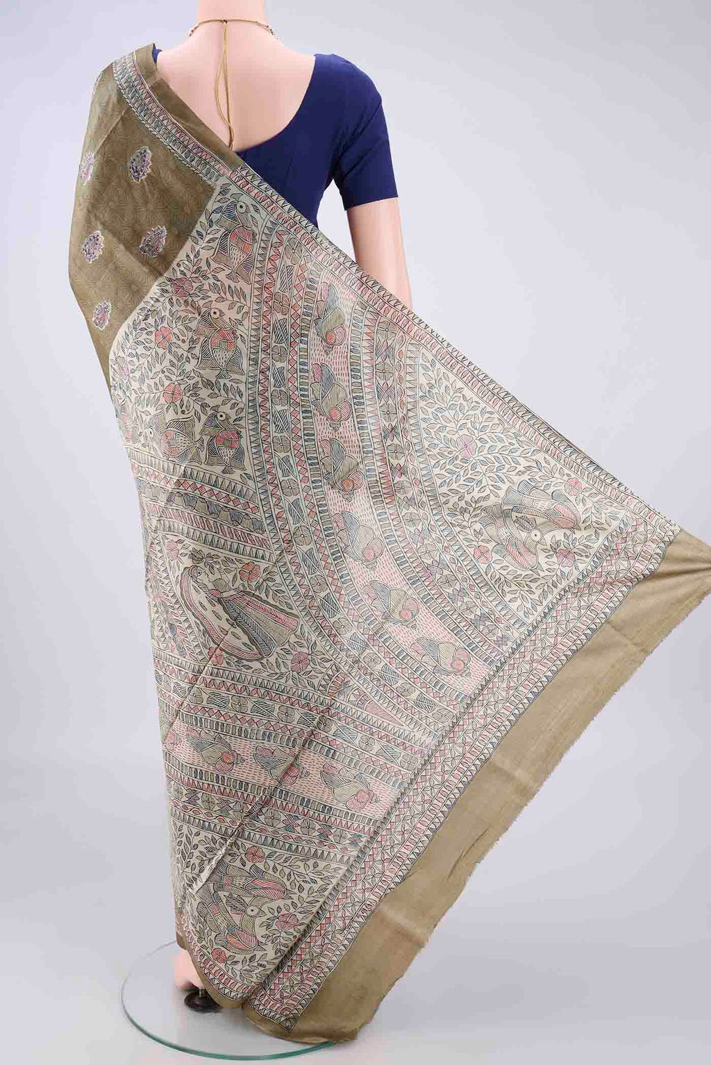 Flat view of Sage Green Tussar Saree with Printed design on the body and Without Border. 