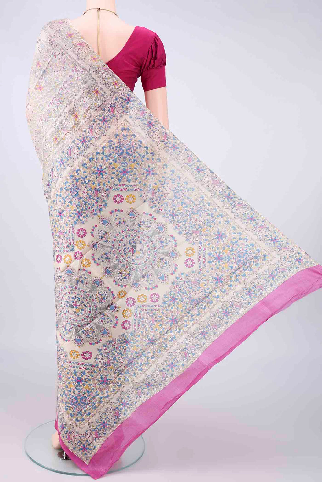Flat view of Beige Tussar Saree with Printed design on the body and Printed Border. 