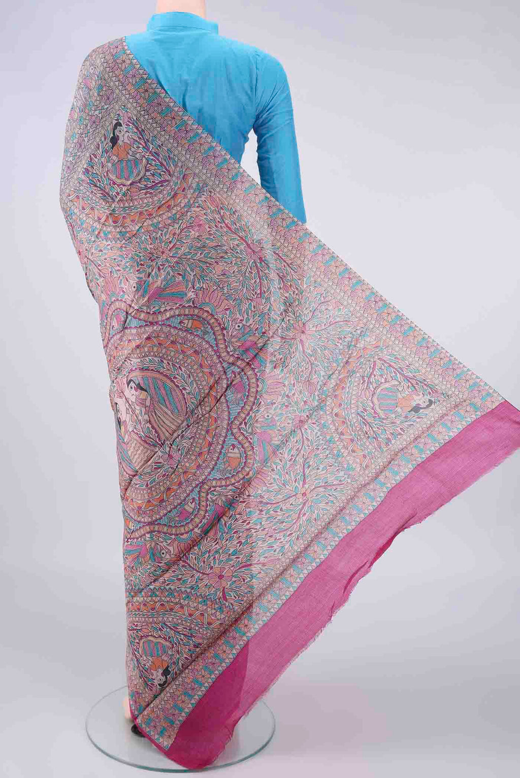 Flat view of Pink Tussar Saree with Printed design on the body and Printed Border. 
