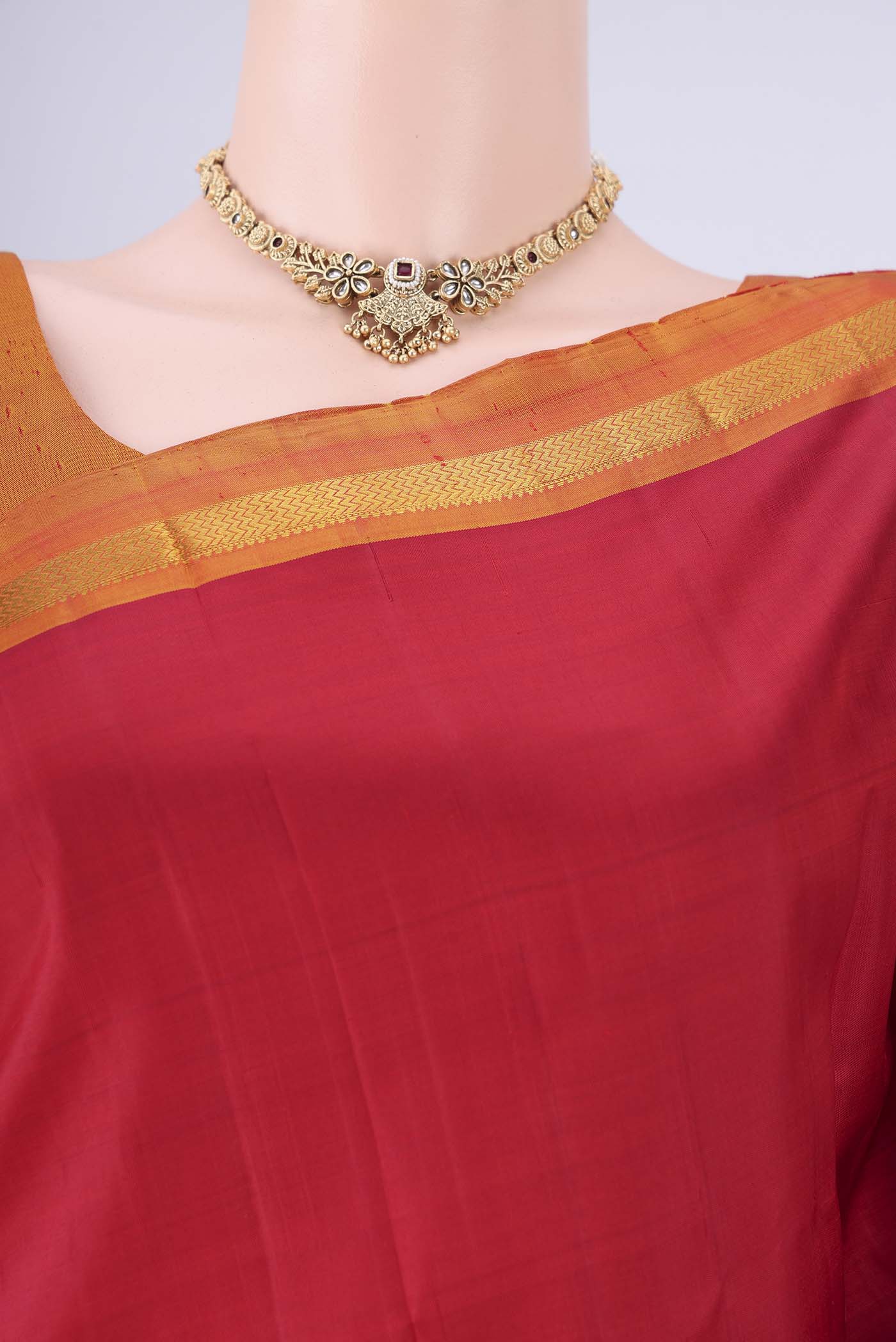 Border image of Red Kanjivaram Silk Saree with Plain Body and Zari Border. 