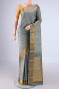 Davys Grey Kanjivaram Silk Saree with Jacquard With Zari Butta on the body and Zari Border.  displayed on a mannequin