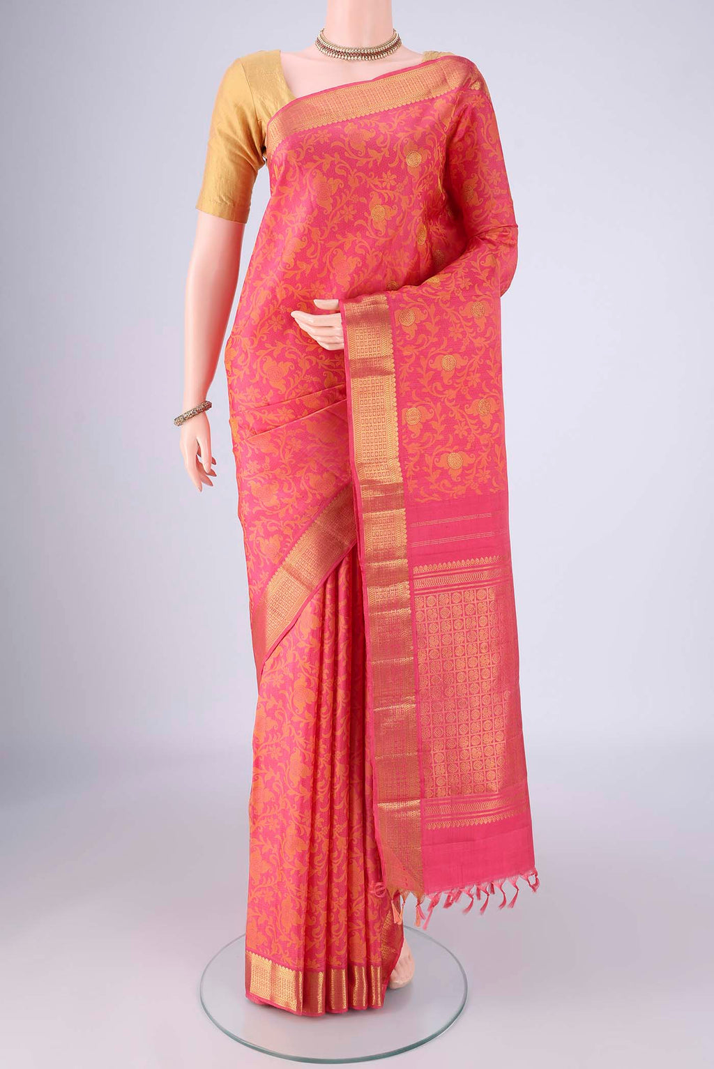 Pink Kanjivaram Silk Saree with Jacquard With Zari Butta on the body and Zari Border.  displayed on a mannequin