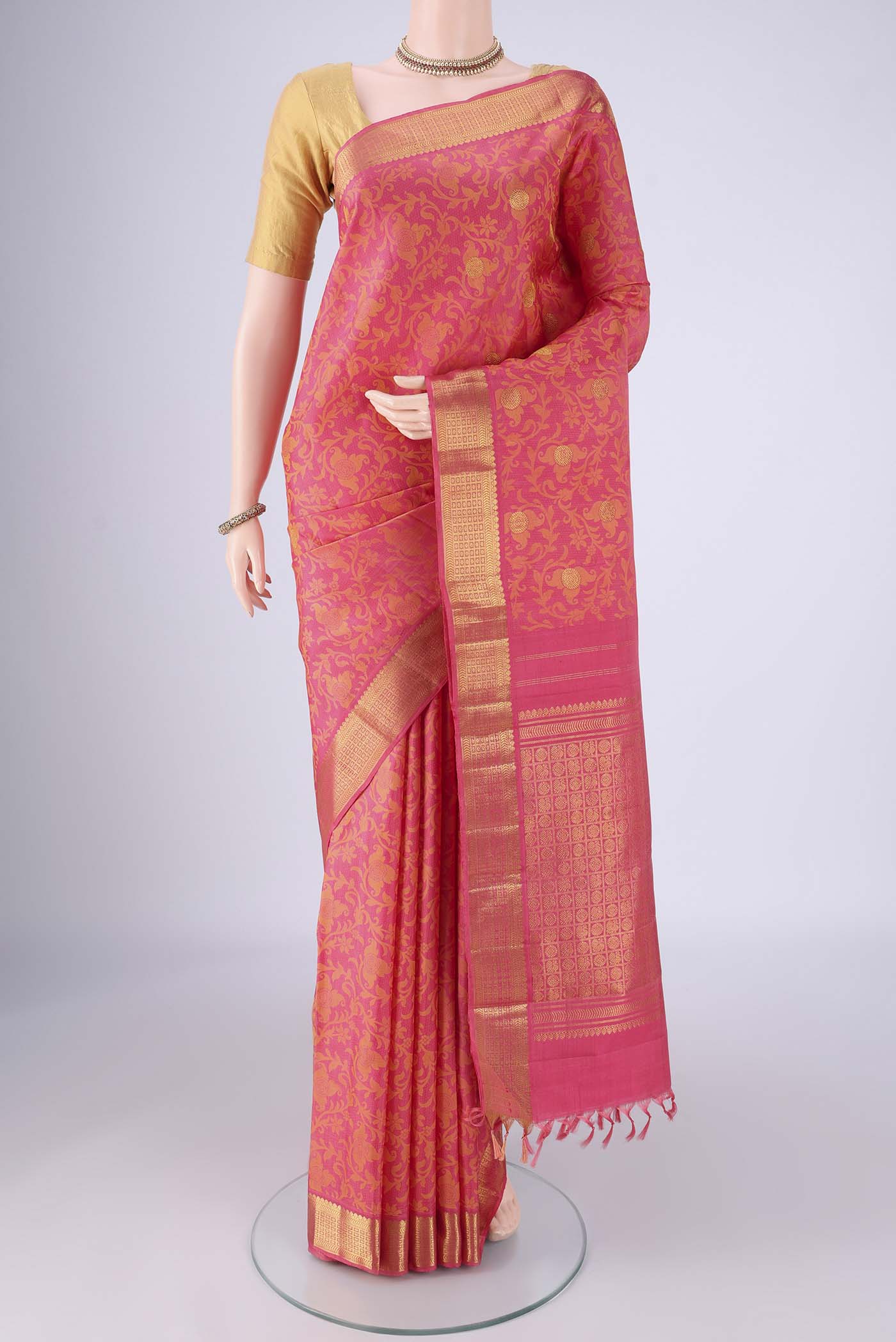 Pink Kanjivaram Silk Saree with Jacquard With Zari Butta on the body and Zari Border.  displayed on a mannequin