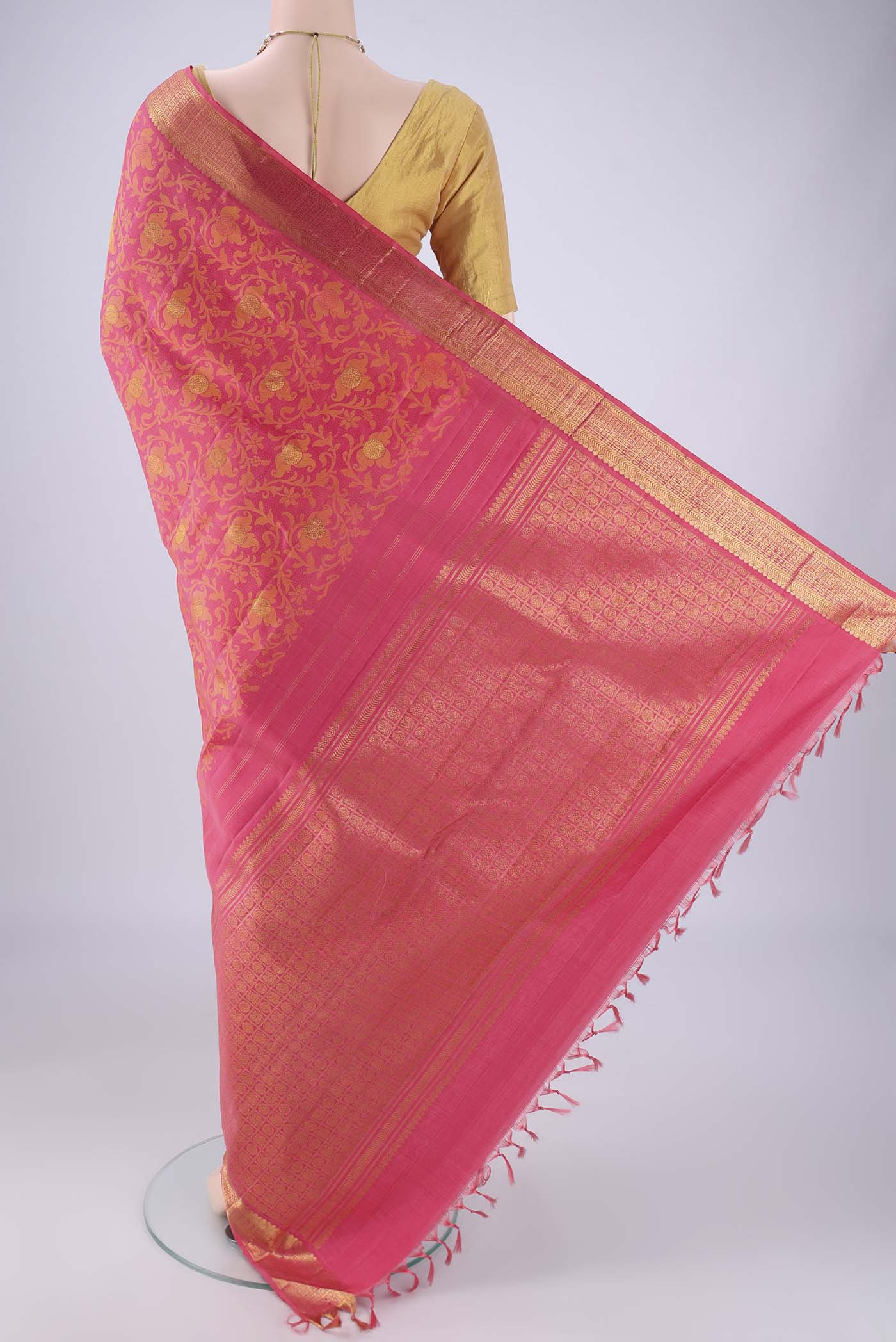 Flat view of Pink Kanjivaram Silk Saree with Jacquard With Zari Butta on the body and Zari Border. 