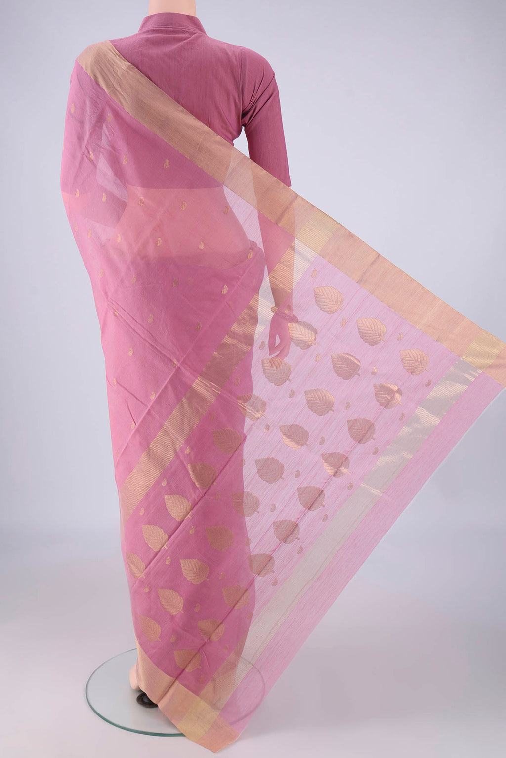 Flat view of Rose pink Chanderi Silk Cotton Saree with Zari And Thread Butta on the body and Zari Border. 