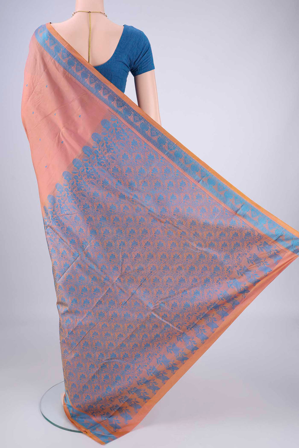 Flat view of Peach Kanchipuram Silk Saree with Thread Butta on the body and Thread Border. 