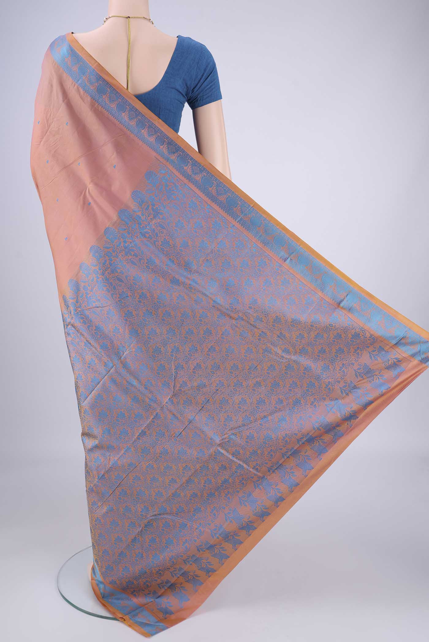 Flat view of Peach Kanchipuram Silk Saree with Thread Butta on the body and Thread Border. 