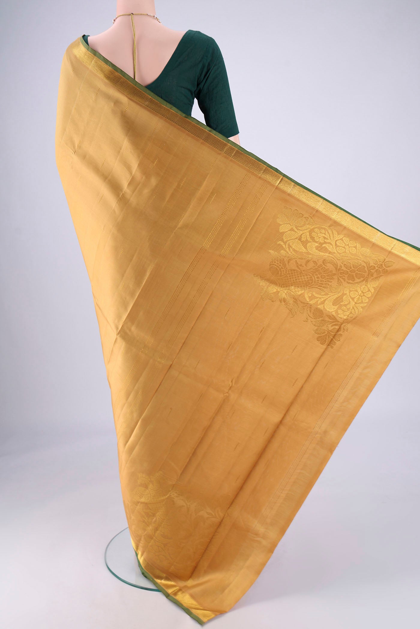 Flat view of Dark Beige Dual Tone Kanjivaram Silk Saree with Zari Butta on the body and Zari Border. 