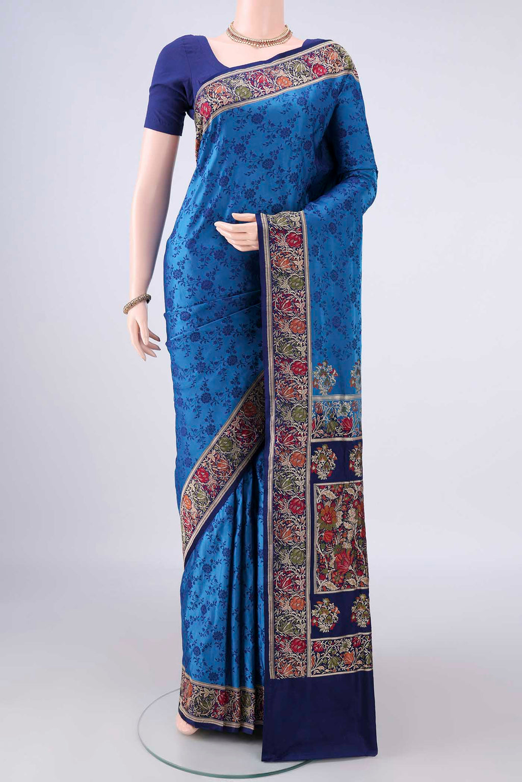 Dark Blue Banarasi Jamavar Saree with Thread Brocade on the body and Zari Border.  displayed on a mannequin