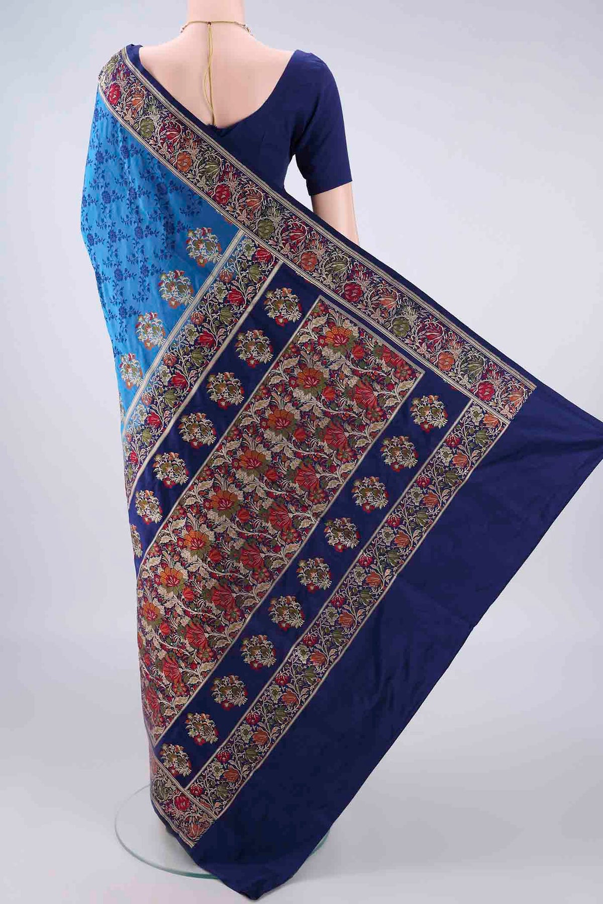 Flat view of Dark Blue Banarasi Jamavar Saree with Thread Brocade on the body and Zari Border. 