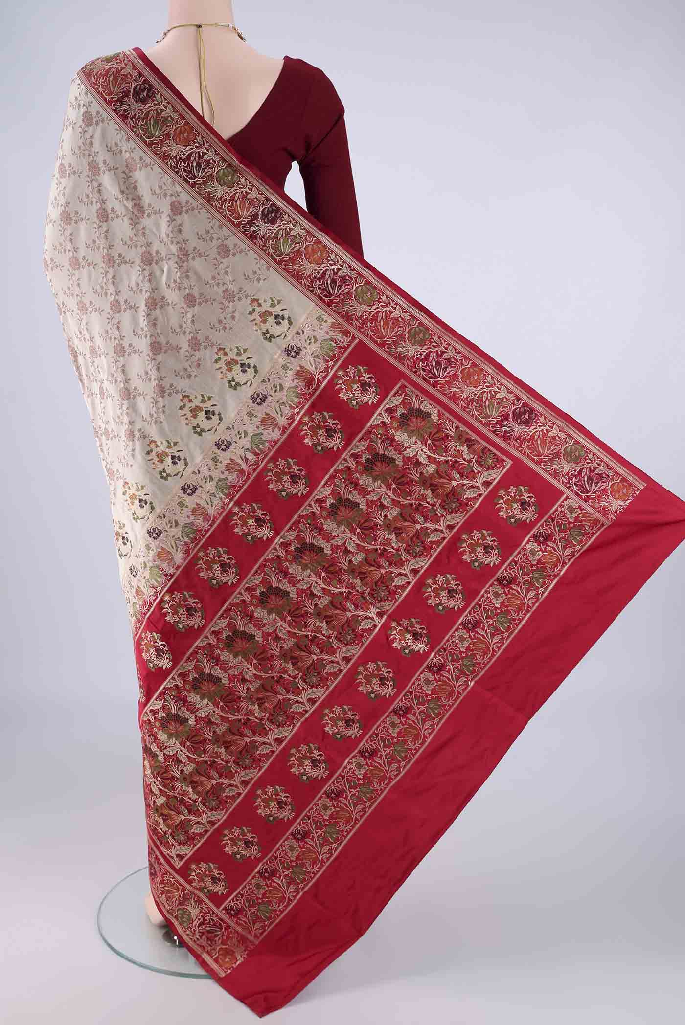 Flat view of Beige Banarasi Jamavar Saree with Thread Brocade on the body and Zari Border. 
