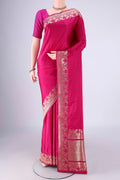 Rani Pink Banarasi Silk Saree with Plain Body and Zari Border.  displayed on a mannequin