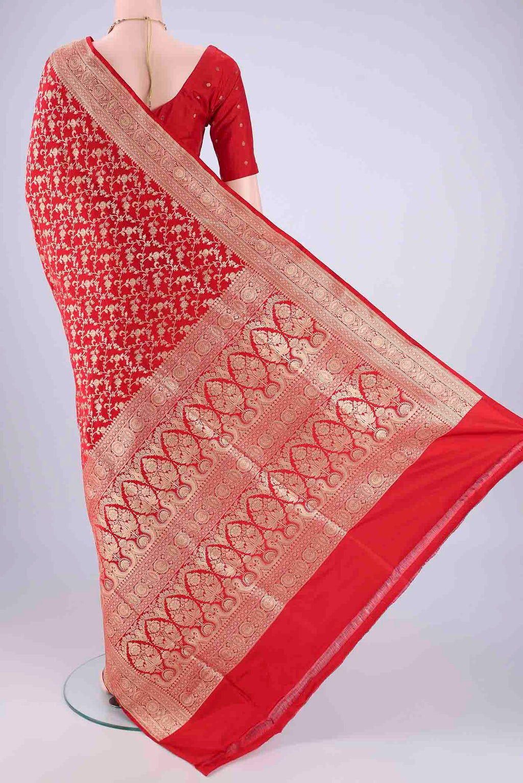 Flat view of Red Banarasi Silk Saree with Zari Brocade on the body and Zari Border. 